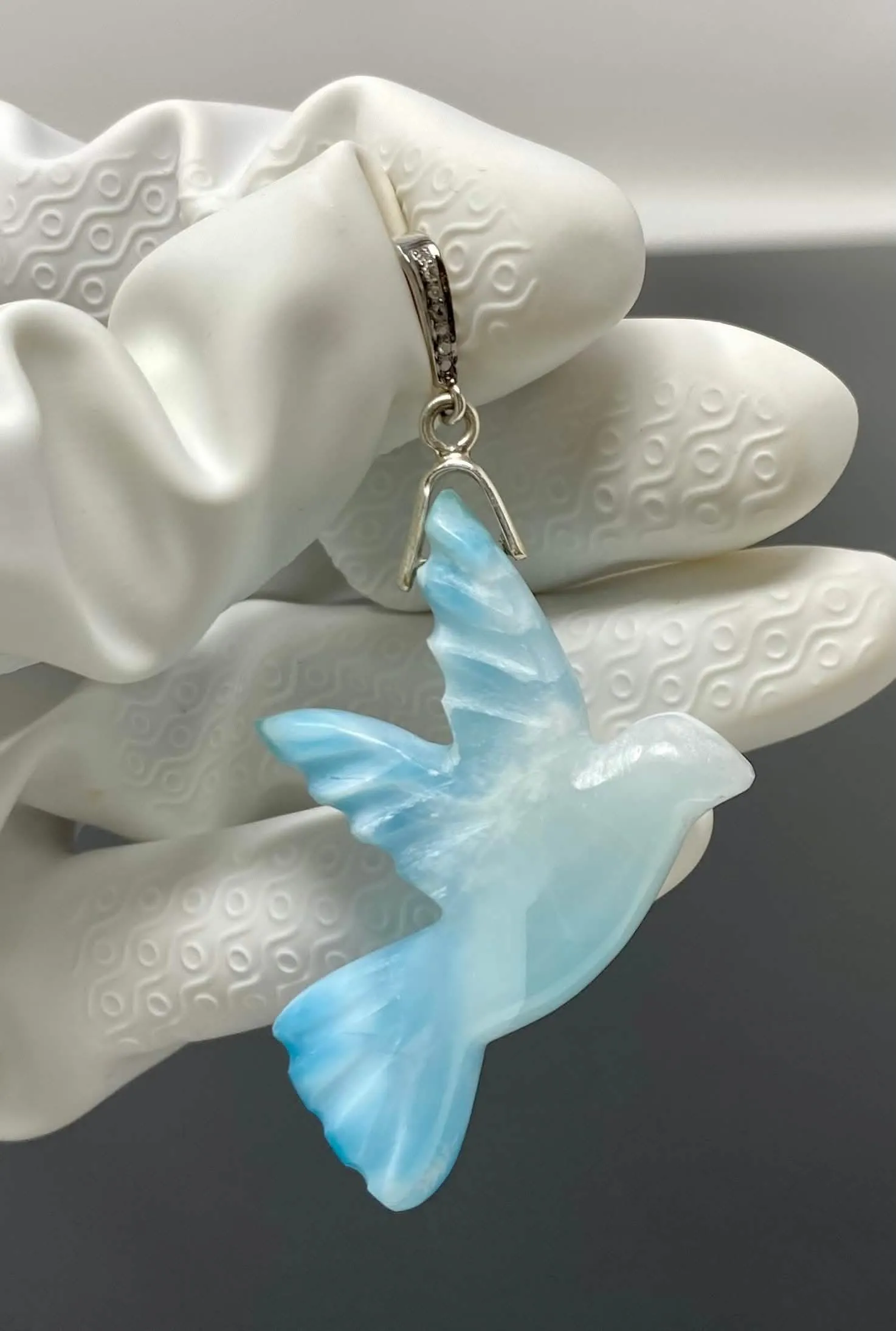 Elegant Hand-Carved Larimar Bird Pendant with Diamond Accents in Sterling Silver