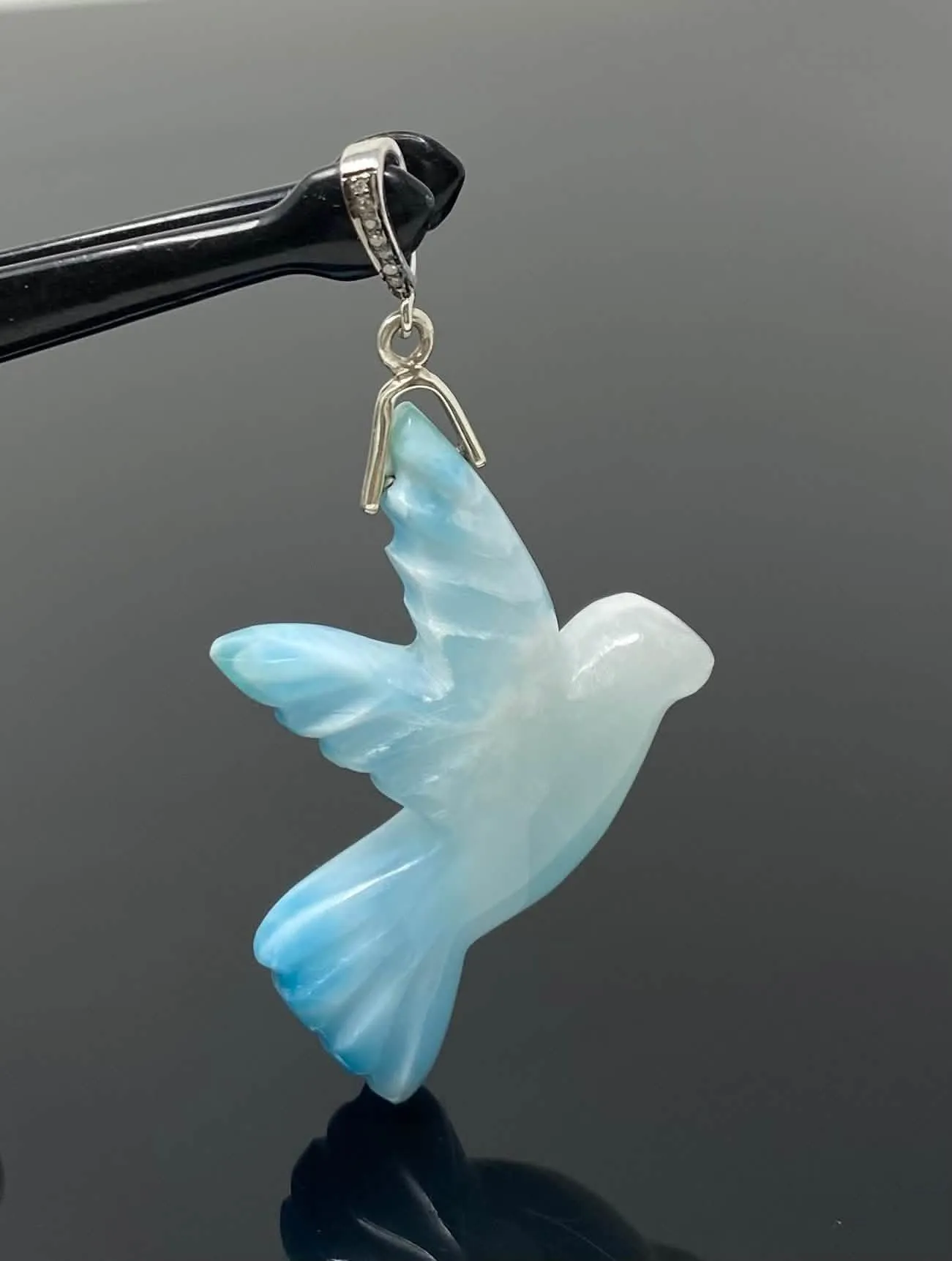 Elegant Hand-Carved Larimar Bird Pendant with Diamond Accents in Sterling Silver