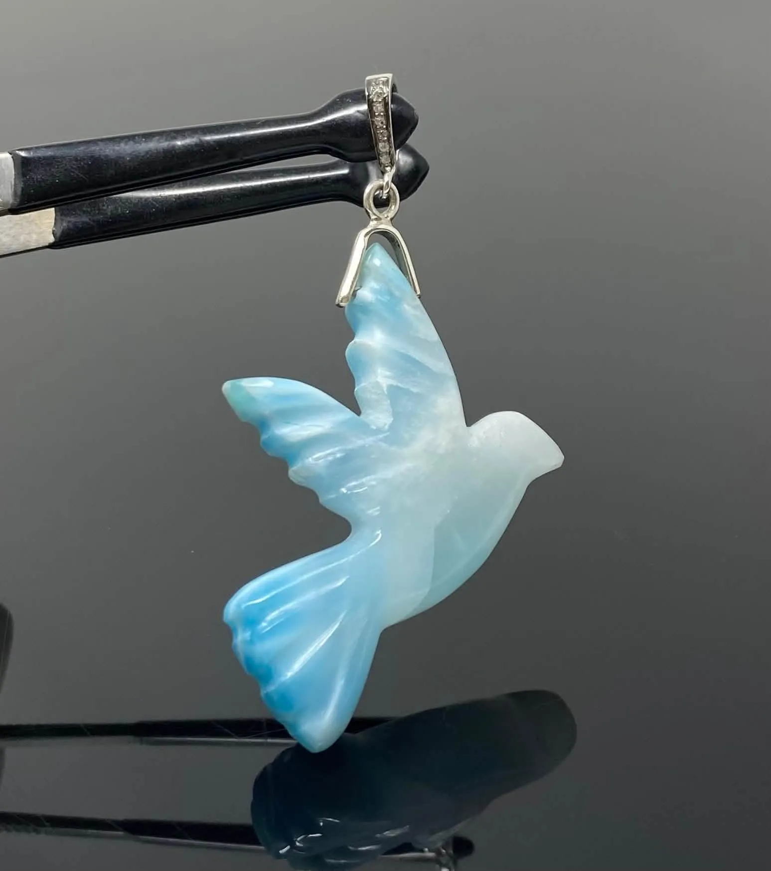 Elegant Hand-Carved Larimar Bird Pendant with Diamond Accents in Sterling Silver