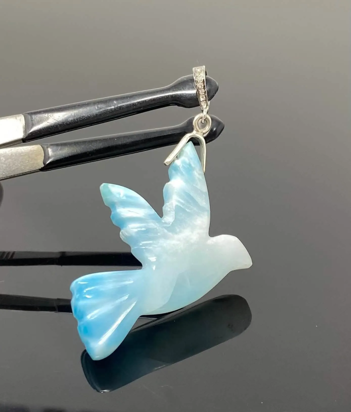 Elegant Hand-Carved Larimar Bird Pendant with Diamond Accents in Sterling Silver