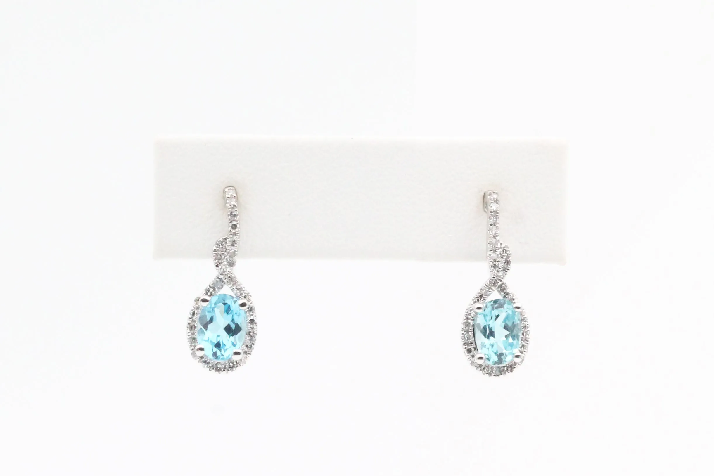 White Gold Blue Topaz Dangle Earrings